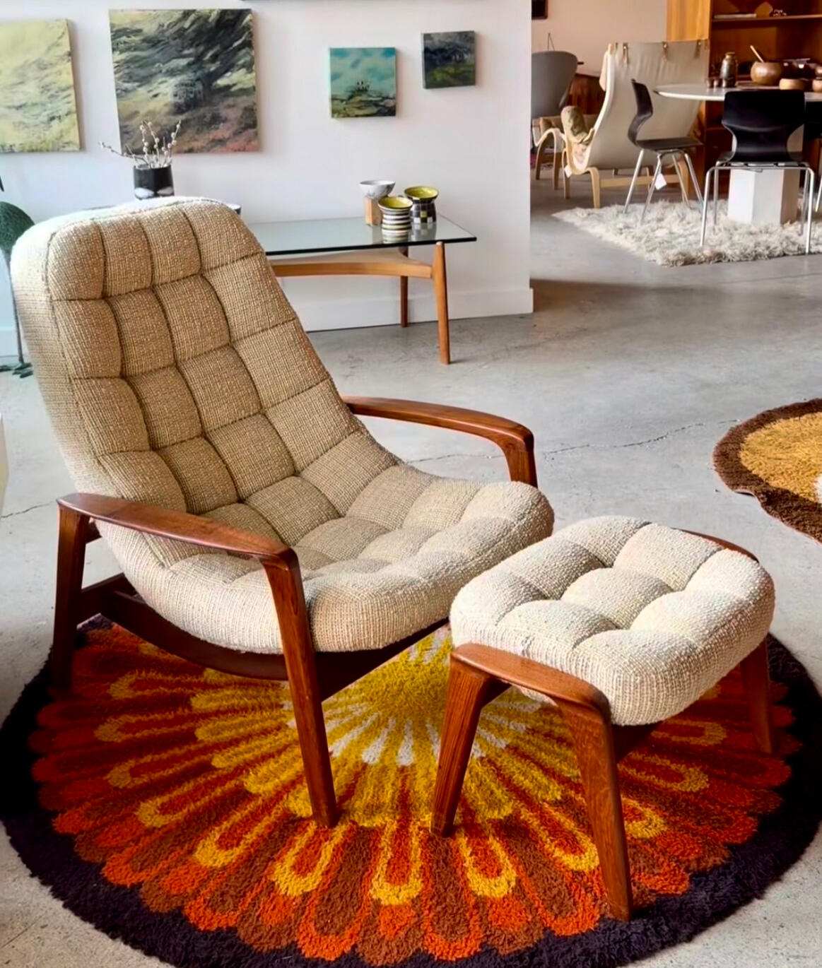 Vintage R Huber scoop chair with ottoman. Teak frame and neutral upholstery.